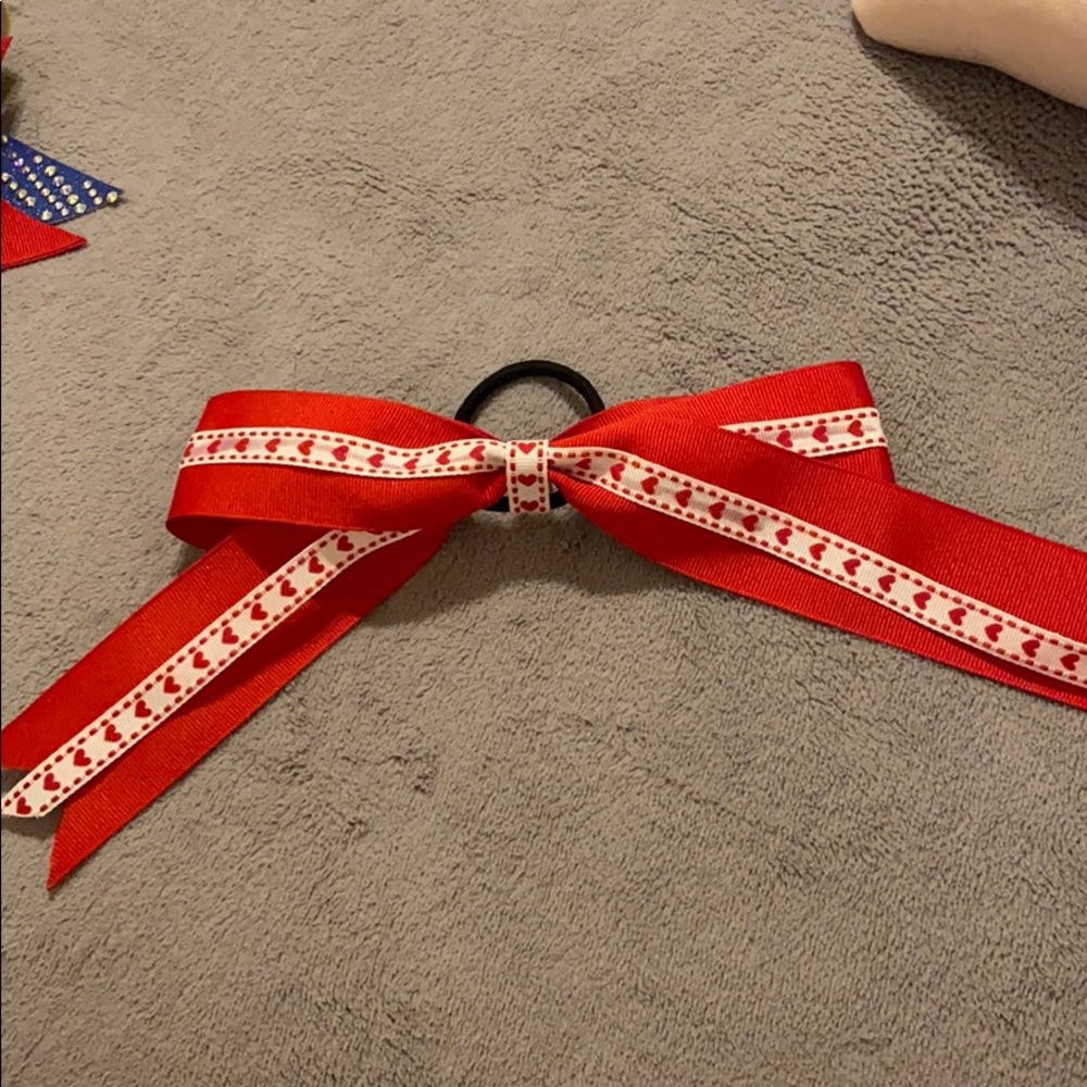 red bow with hearts